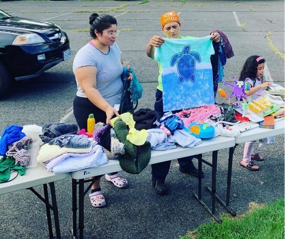 family looking through clothes